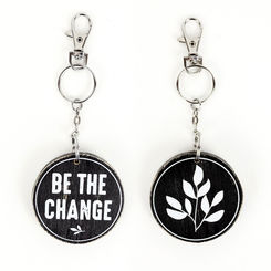 Click here to see Adams&Co 15580 15580 2x2x.25 reversible wood keychain (CHANGE) black, white Be the Change Collection