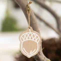 Click here to see Adams&Co 50487 50487 3x4x.25 wood ornament (ACORN) natural, white  Adams Family Collection