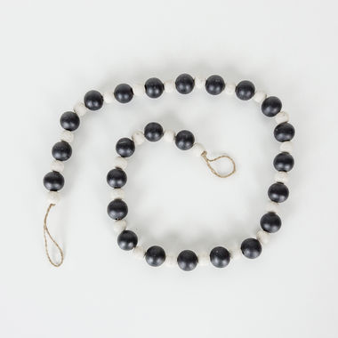 Click here to see Adams&Co 55079 55079 36x1 wood bead garland varied, black, white