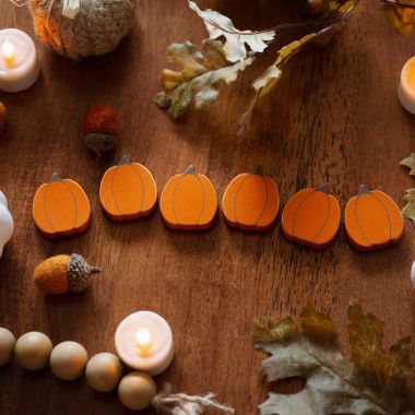 Click here to see Adams&Co 65074 65074 2x2x.25 wood shapes set of six (PUMPKINS) orange, brown Letterboard Collection