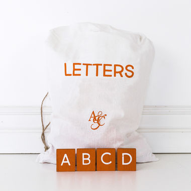 Click here to see Adams&Co 15264 15264 11x20x.25 bag 70 pieces 2x2x.25 (PUMPKIN) orange, white Letterboard Collection
