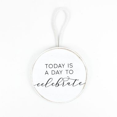 Click here to see Adams&Co 11349 11349 5x5x.5 round wood ornament (CELEBRATE) white, black Floral Accessories Collection