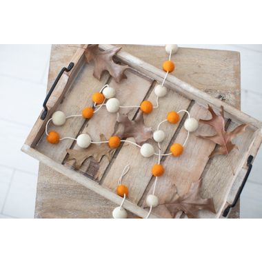 Click here to see Adams&Co 50319 50319 72x1.25 felt ball garland, white, orange  