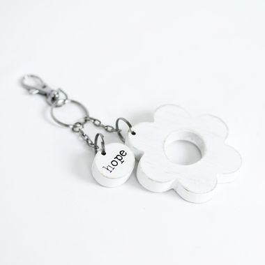 Click here to see Adams&Co 30239 30239 3x3x.5 wood keychain (HOPE) white, black Spring Collection