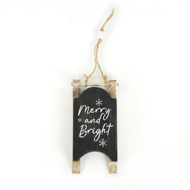 Click here to see Adams&Co 71018 71018 6x4x.75 wood sled ornament sign (MERRY & BRIGHT) black, white Cottage Christmas Collection