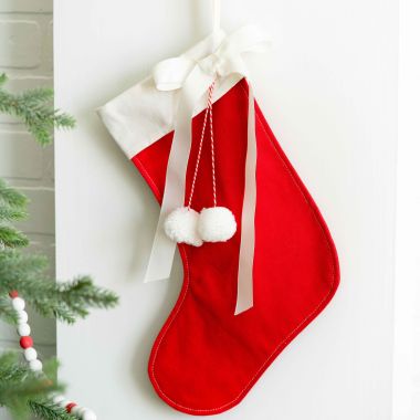 Click here to see Adams&Co 71245 71245 12x18 canvas stocking (STOCKING) red, white Candy Cane Lane Collection
