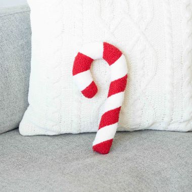 Click here to see Adams&Co 71244 71244 6x13x2 plush (CANDY) red, white Candy Cane Lane Collection