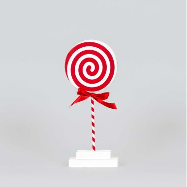 Click here to see Adams&Co 71242 71242 5x10x.25 wood shape on stand (LOLLIPOP) red, white  Candy Cane Lane Collection
