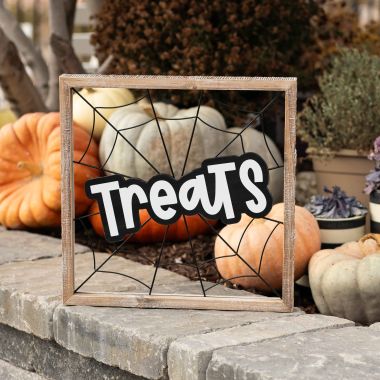 Click here to see Adams&Co 50497 50497 17x17x1.5 wood frame sign (TREATS) white, black  Adams Family Collection