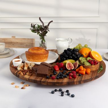 Click here to see Adams&Co 12689 12689 24x24x1.75 teak rotating serving board (LADY) brown  Teak Wood Collection