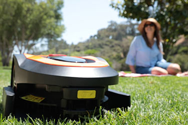 Women enjoying outdoors with MowRo mower